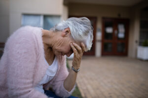 A senior woman who is a victim of physical abuse in nursing homes in Atlanta